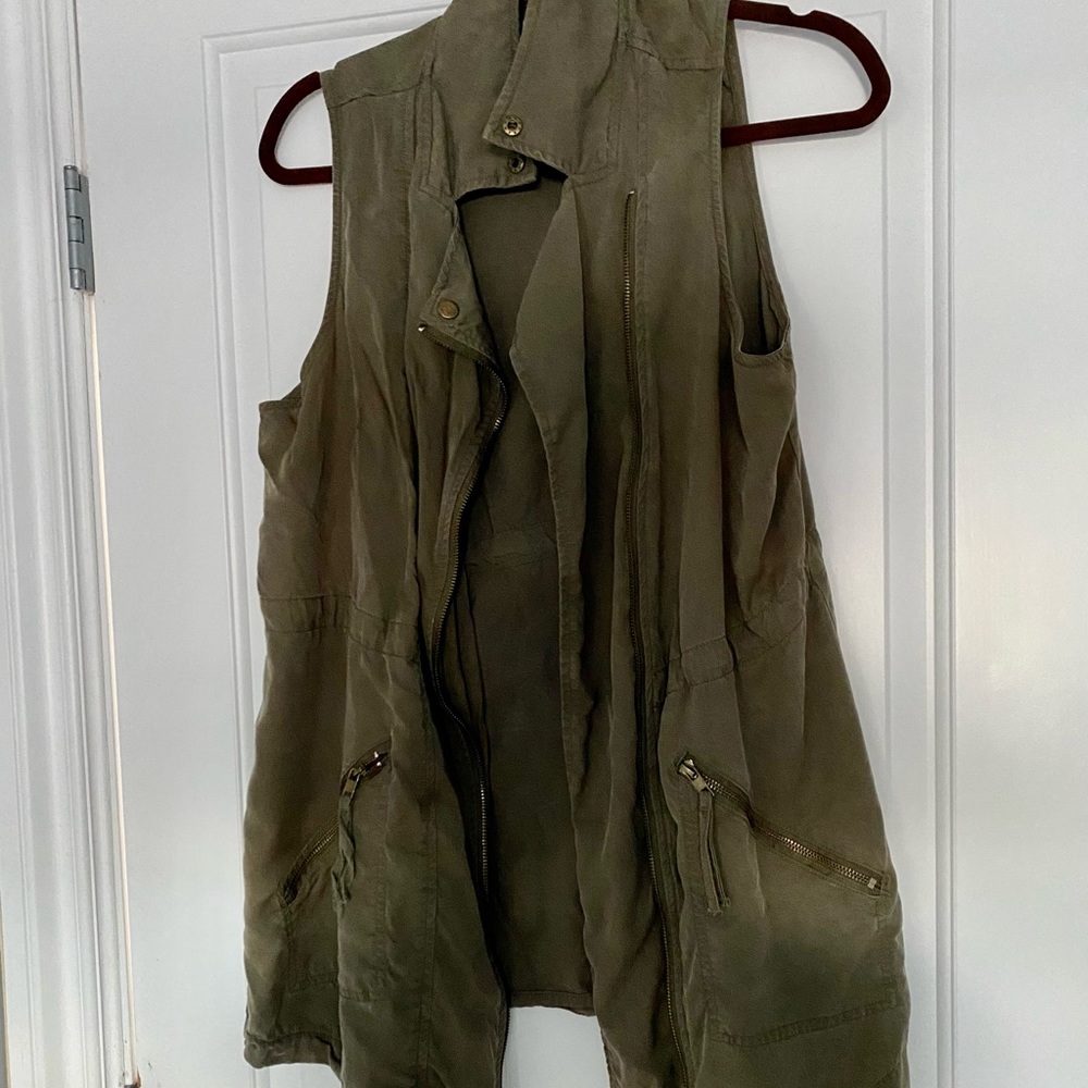Olive green vest. Great layering piece.